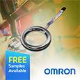 The OMRON W7BB-X01 transparent button, designated the 