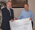 Charity donation ceremony at Anglia's recent Corporate Event